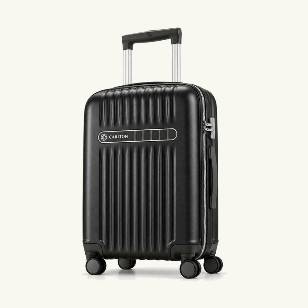 Carlton ribbed hard shell cabin suitcase in black with charcoal trim and silver hardware, four wheels