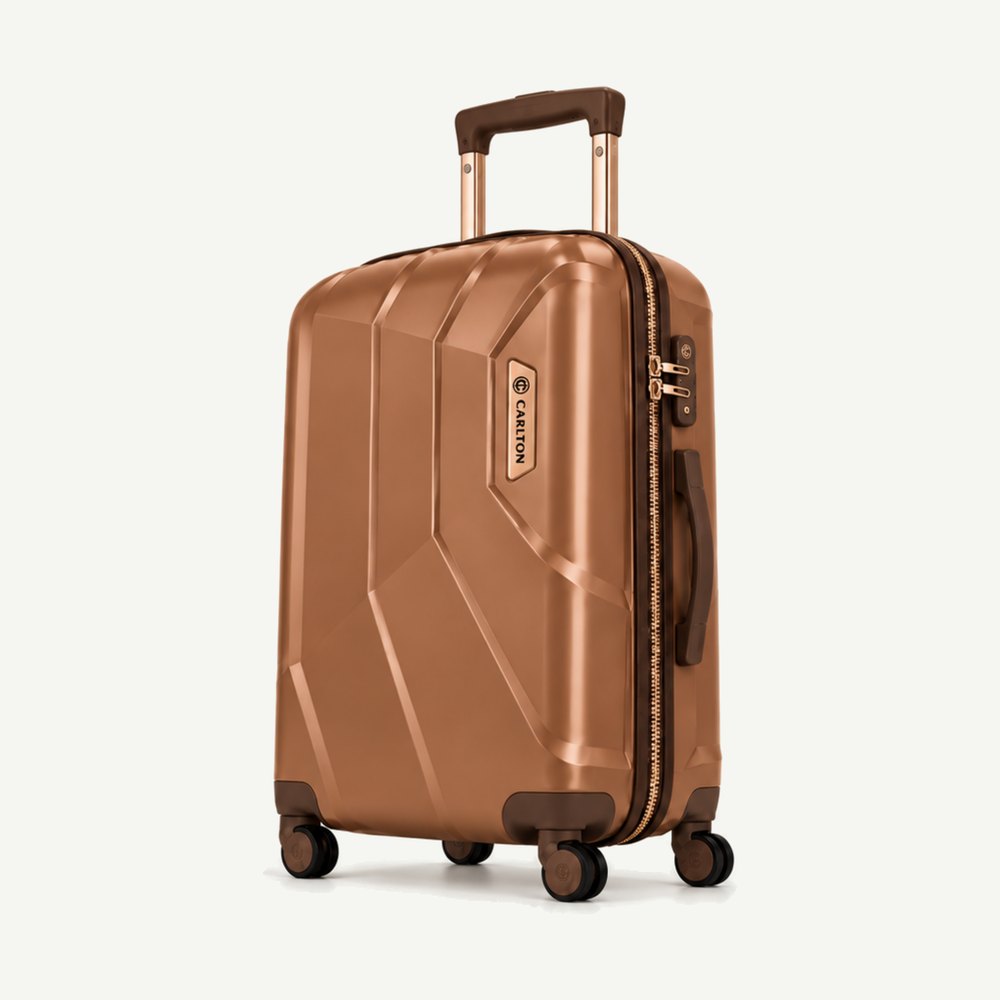 Carlton faceted hard shell suitcase in copper brown with bronze hardware, four wheels