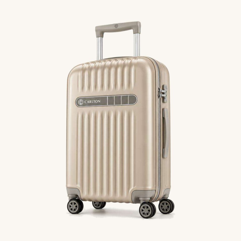 Carlton ribbed hard shell cabin suitcase in stone beige with light grey trim and silver hardware, four wheels
