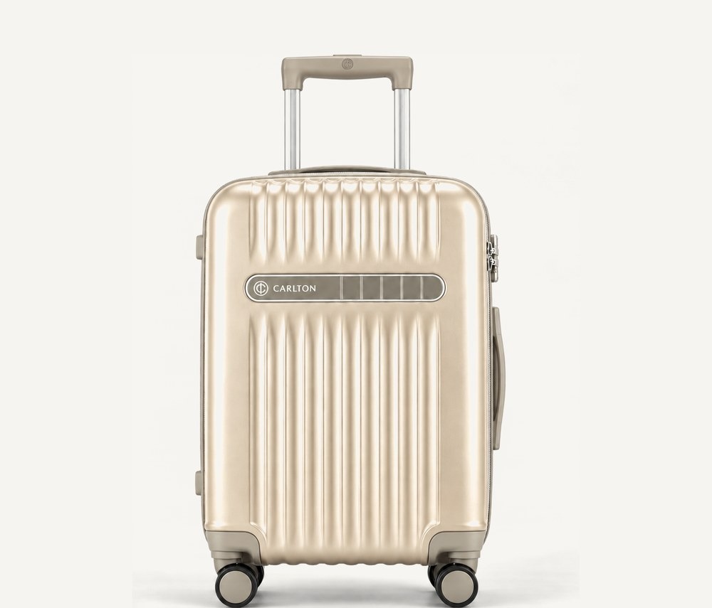 Carlton ribbed hard shell cabin suitcase in warm ivory with saddle brown trim and handles, four wheels